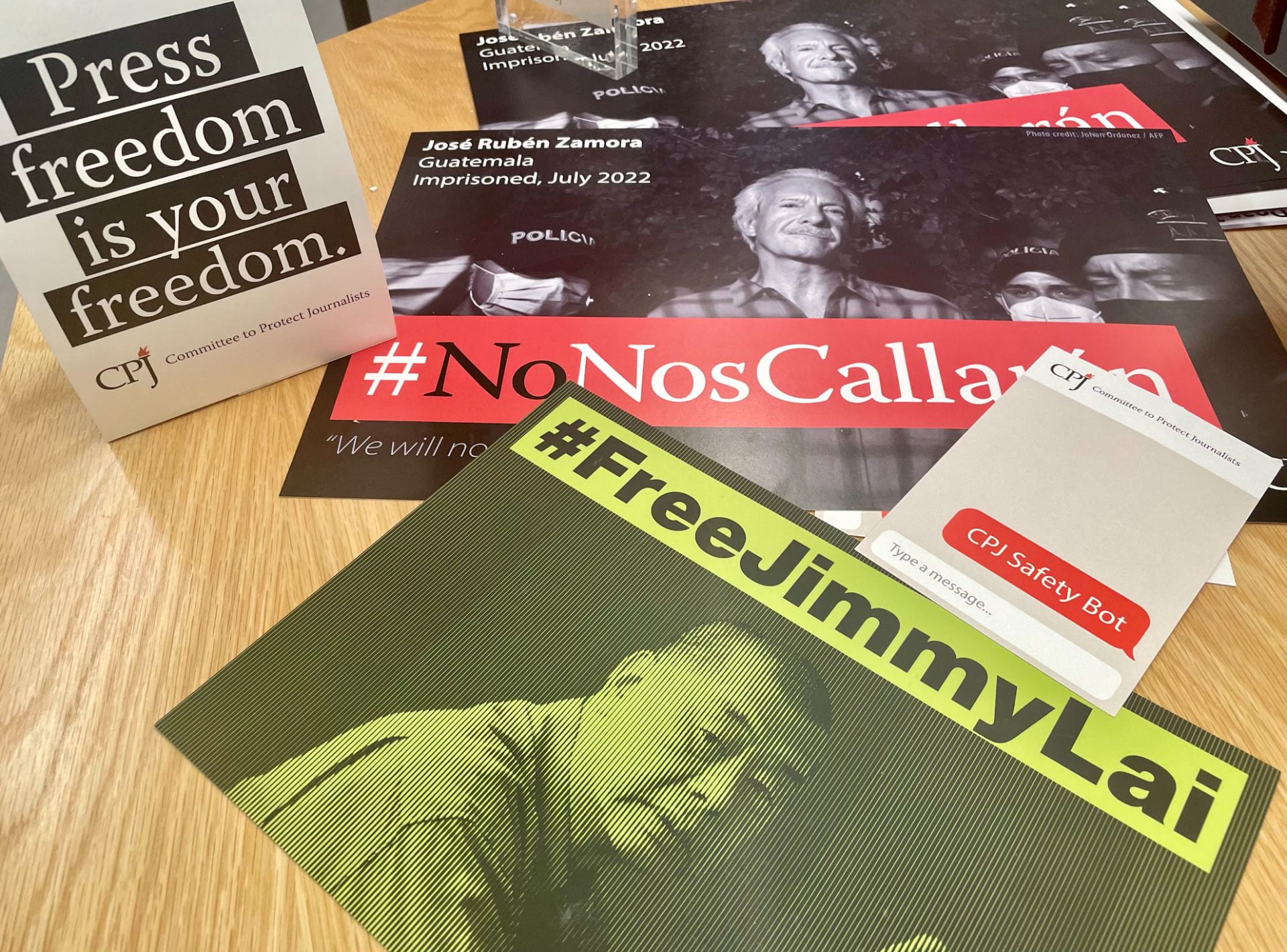 Brochures on table with #FreeJimmyLai and Press freedom is your freedom 